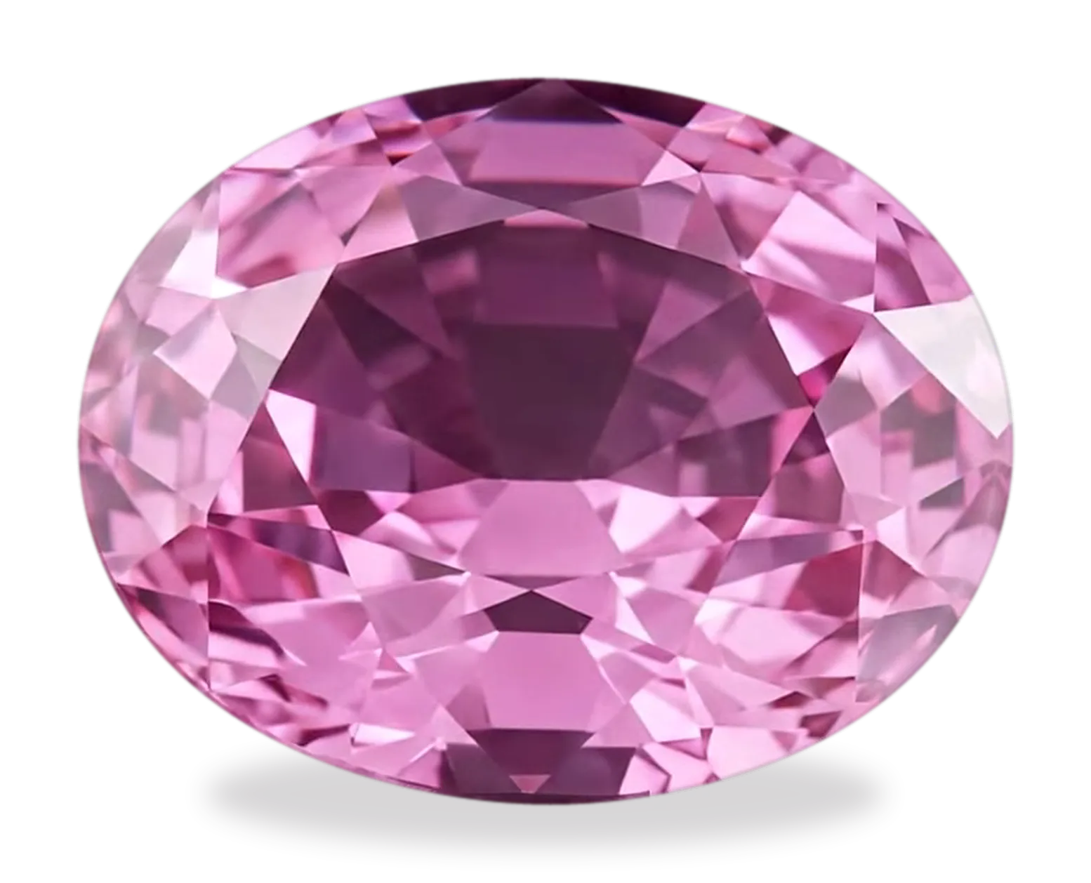 An oval pink sapphire, faceted, seen from above.